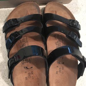 Birki’s black patent sandals